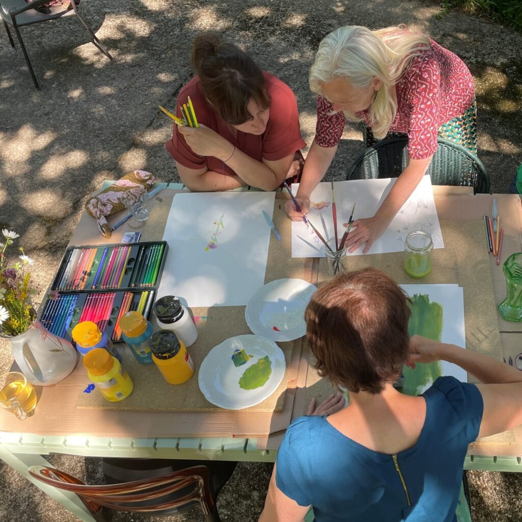 Drawing instructions during art class creative holiday in France